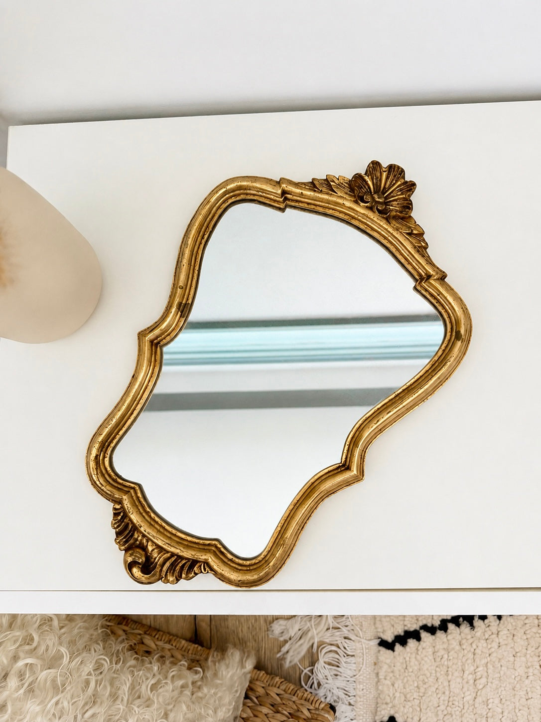 Miroir ancien de style baroque doré
