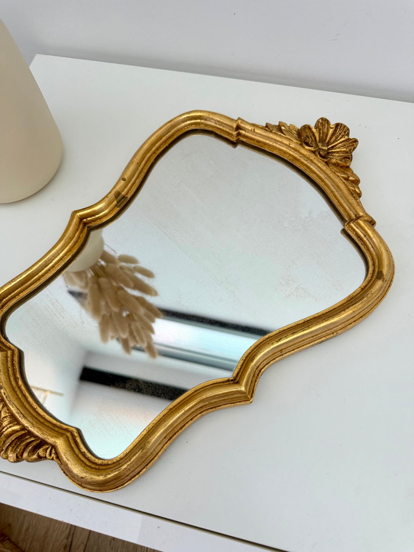 Miroir ancien de style baroque doré