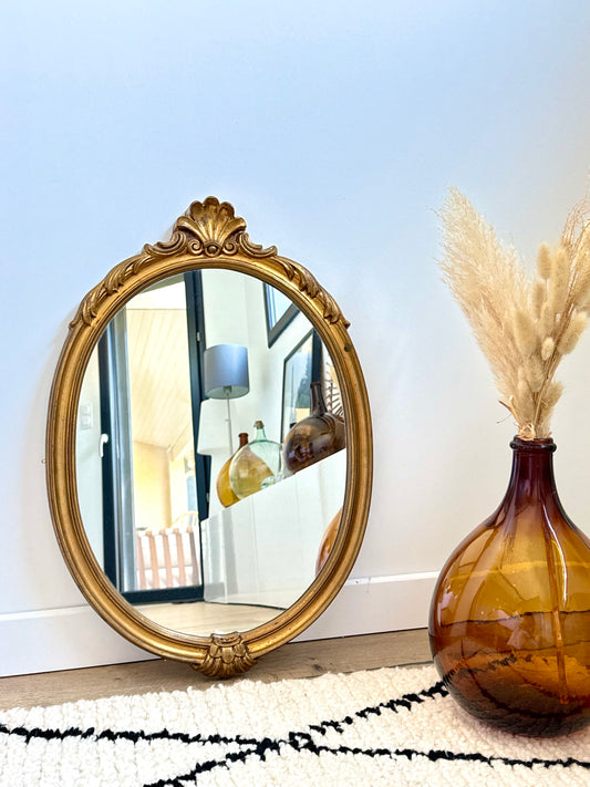 Miroir ovale doré