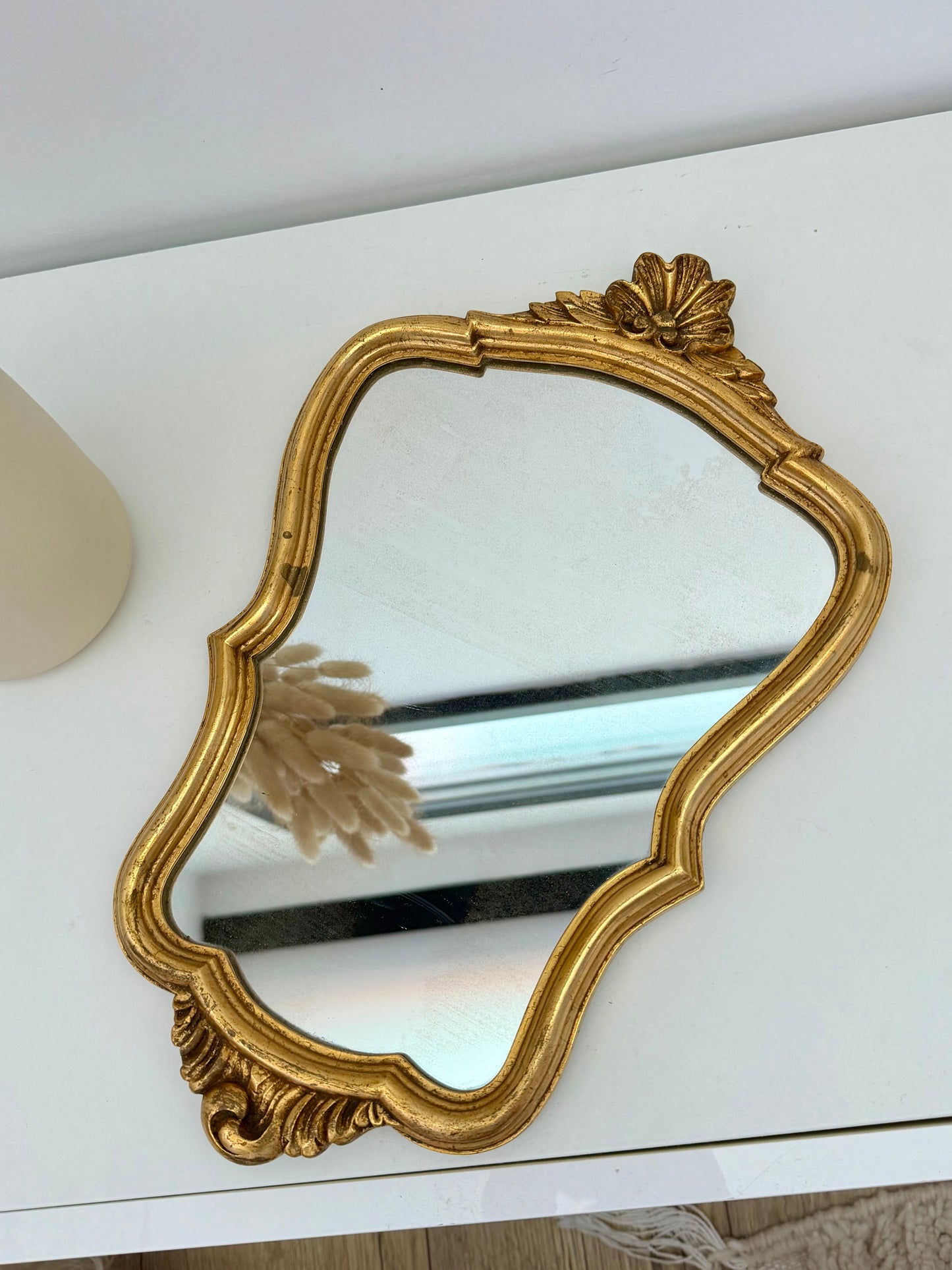 Miroir ancien de style baroque doré