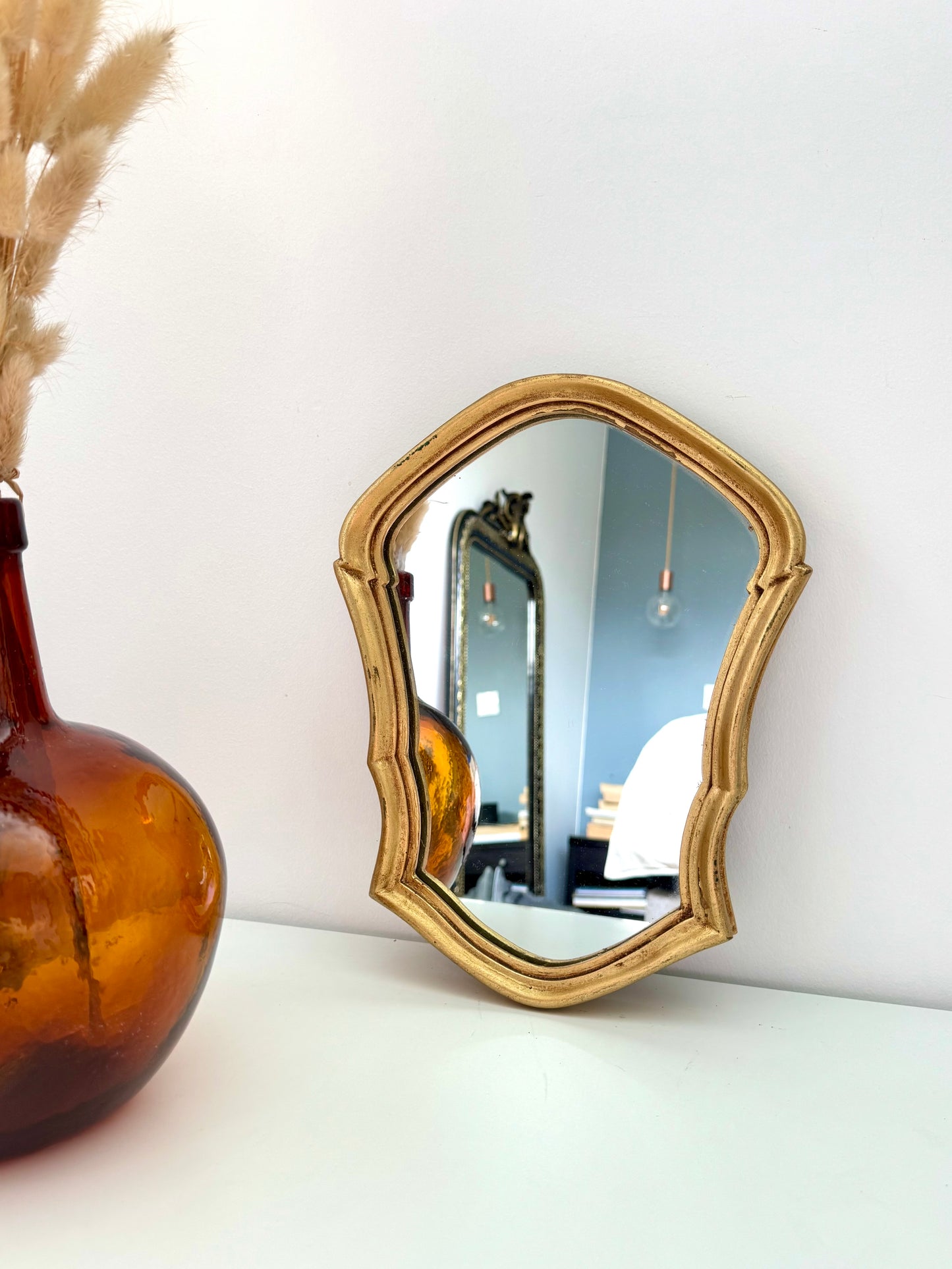 Petit miroir doré de style baroque