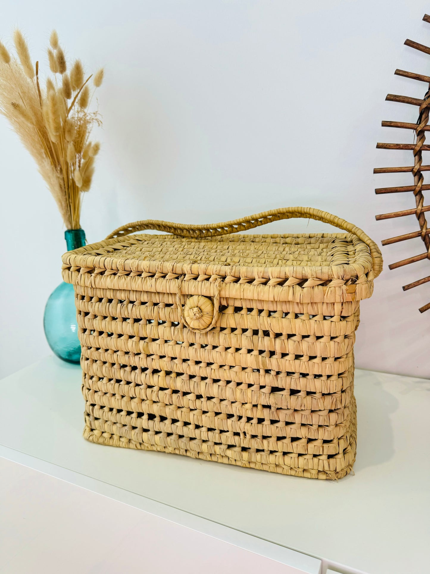 Malle de rangement en feuilles de palmier