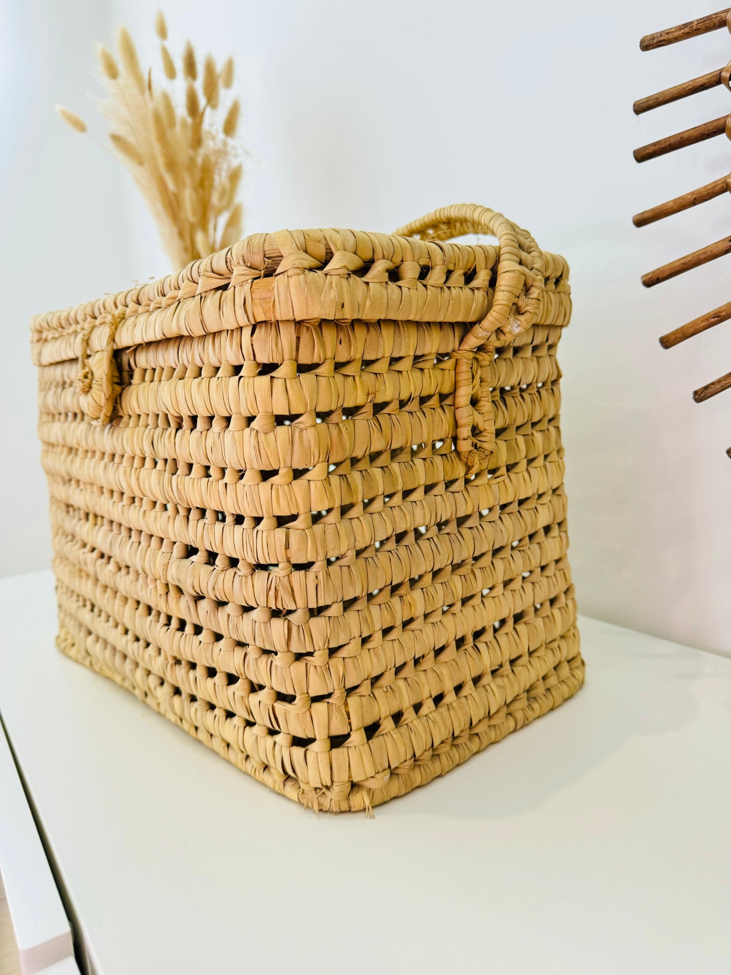 Malle de rangement en feuilles de palmier