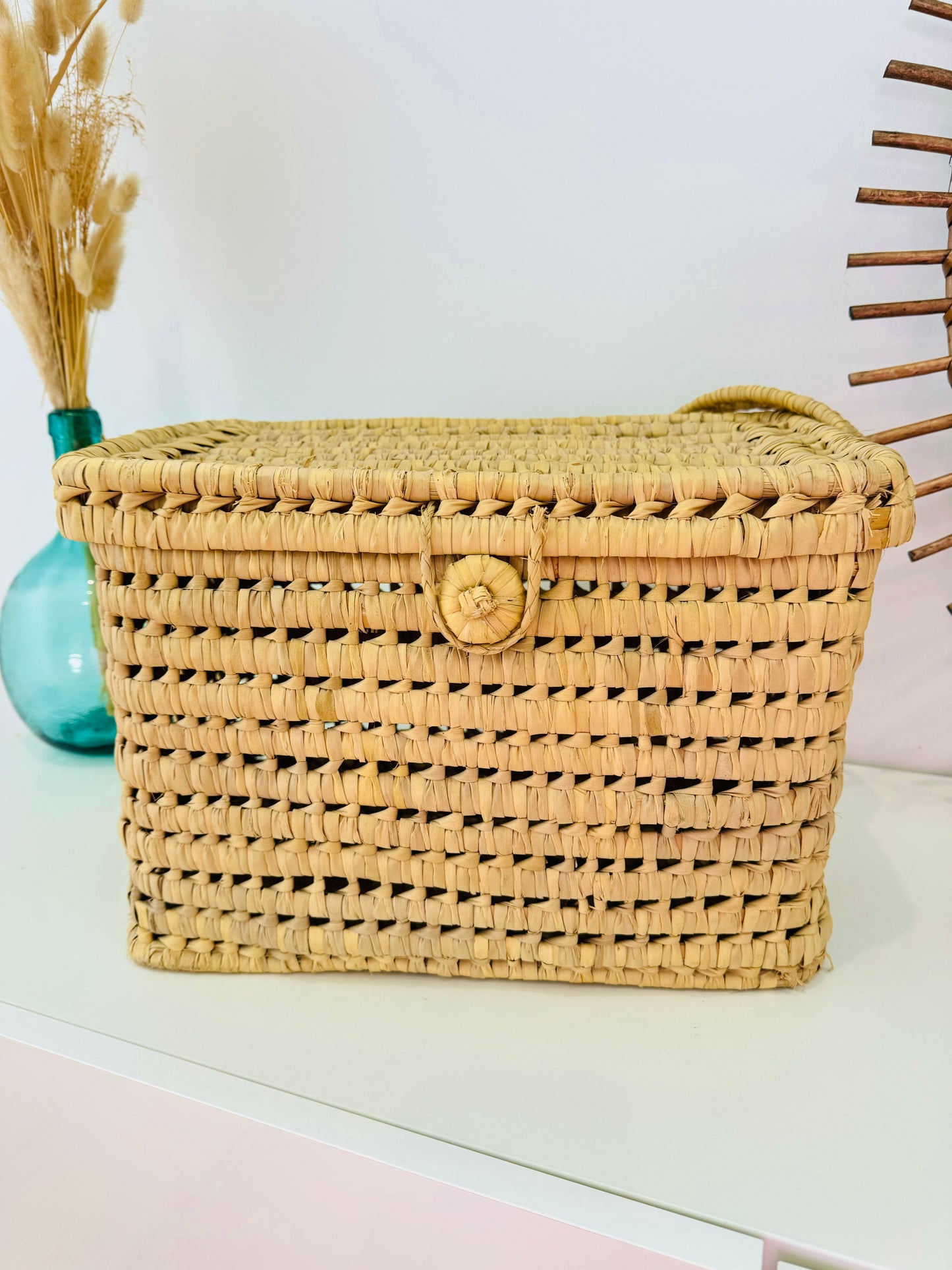 Malle de rangement en feuilles de palmier
