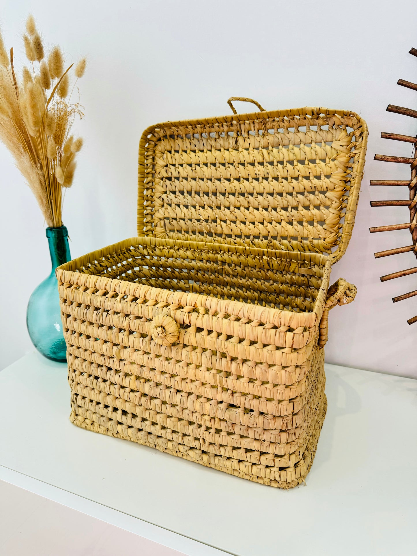 Malle de rangement en feuilles de palmier