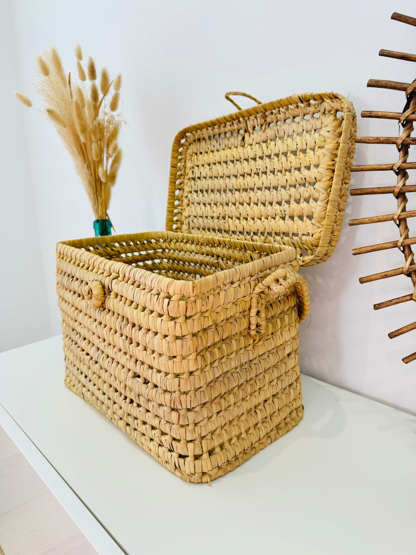 Malle de rangement en feuilles de palmier