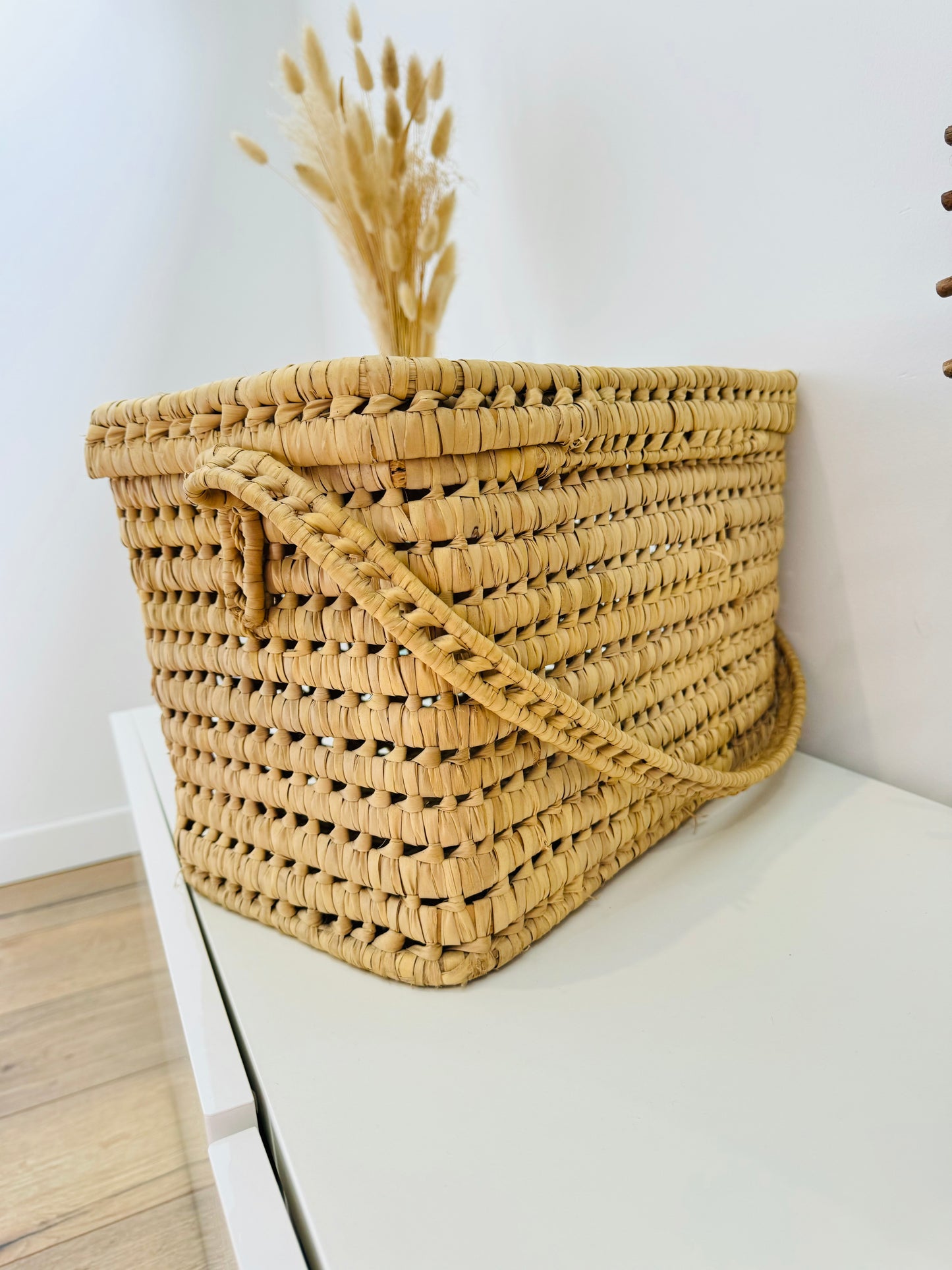 Malle de rangement en feuilles de palmier
