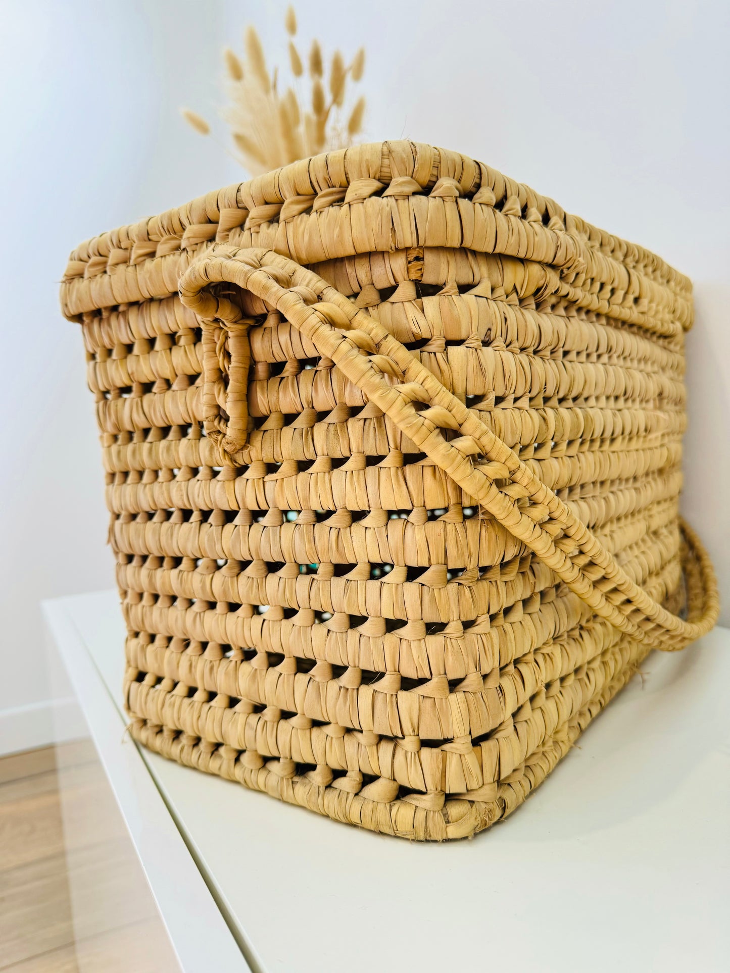 Malle de rangement en feuilles de palmier