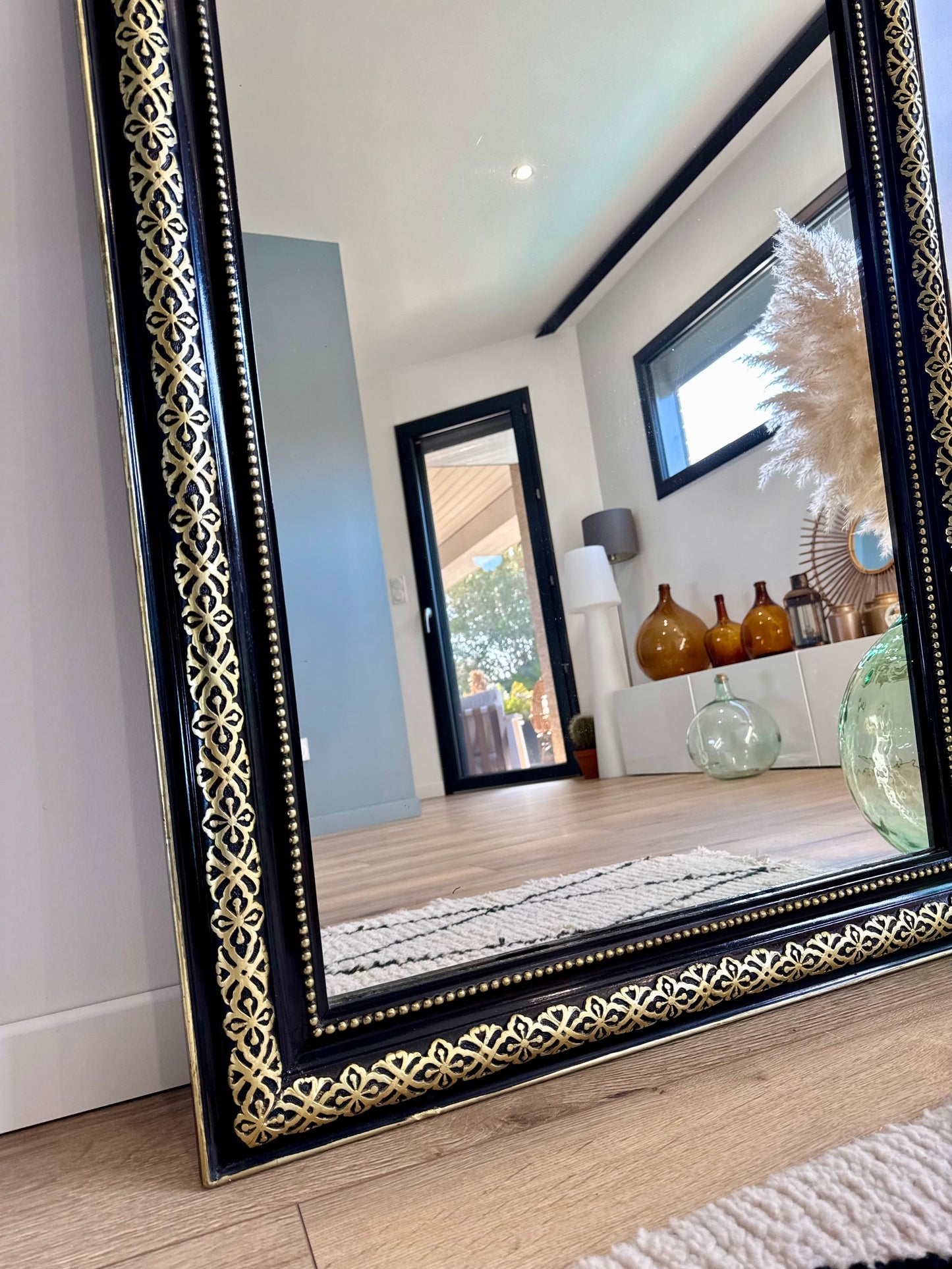 Miroir ancien au style Napoléon III, doré à la feuille d'or