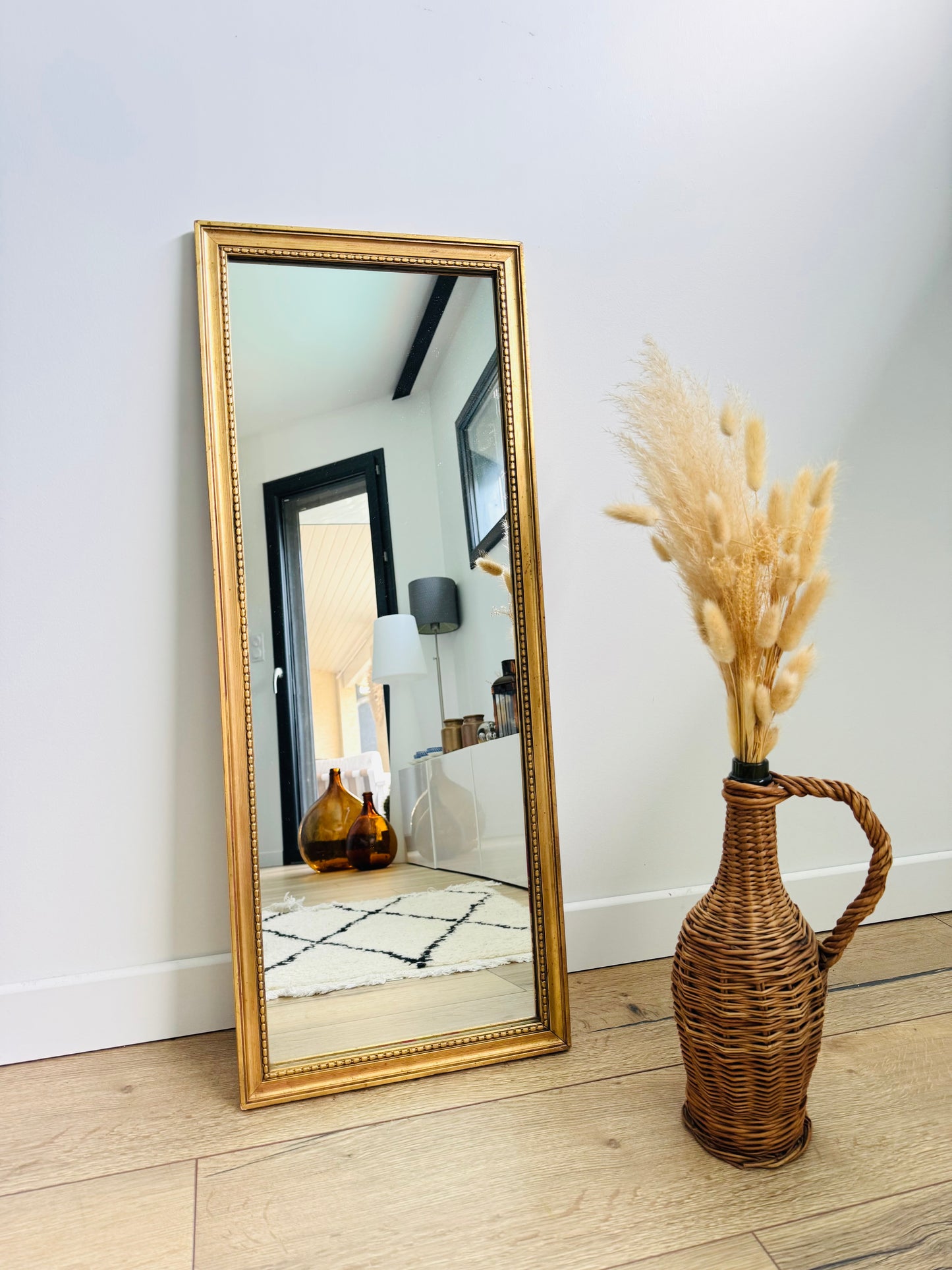 Miroir ancien doré au style classique
