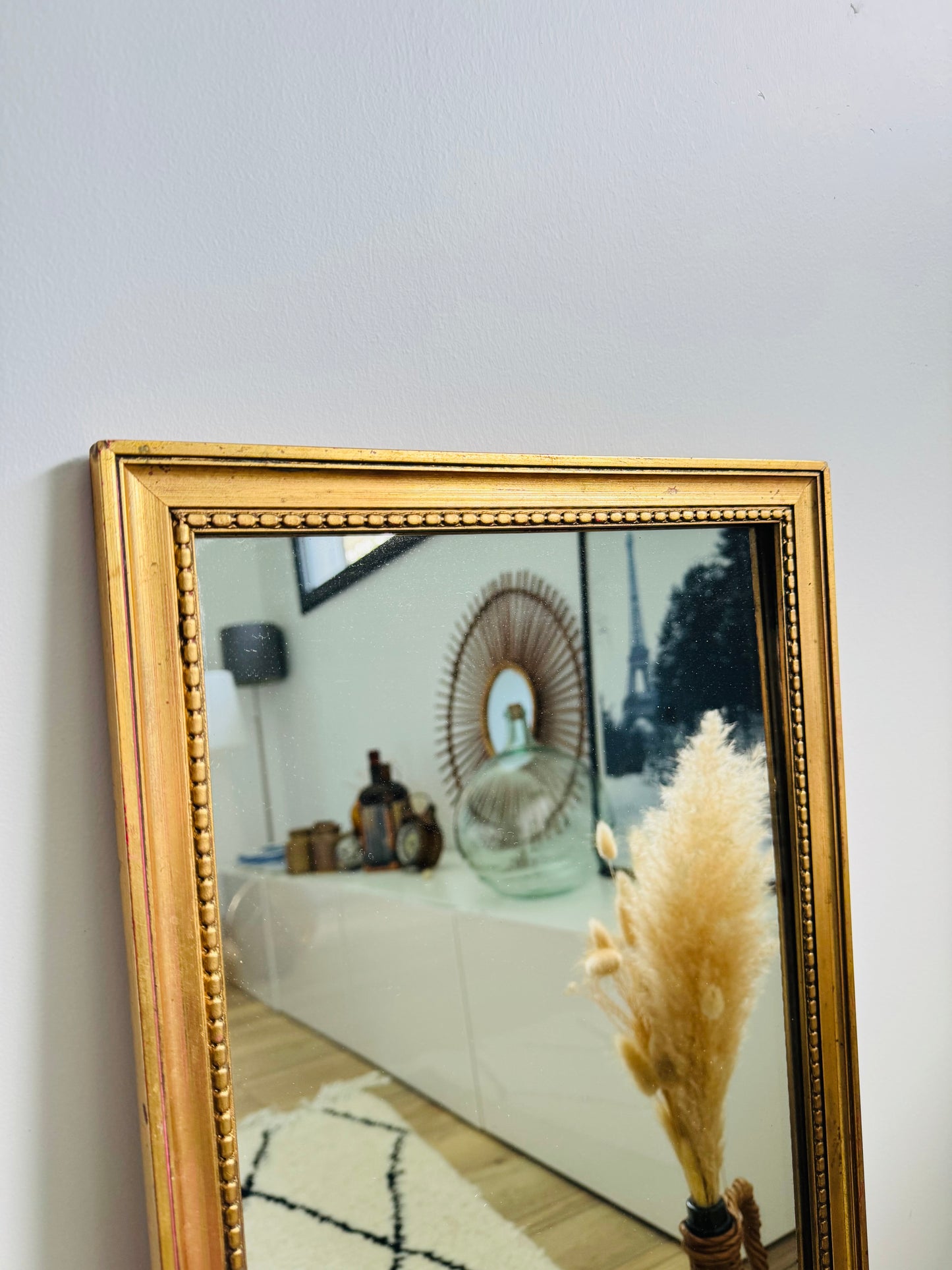 Miroir ancien doré au style classique