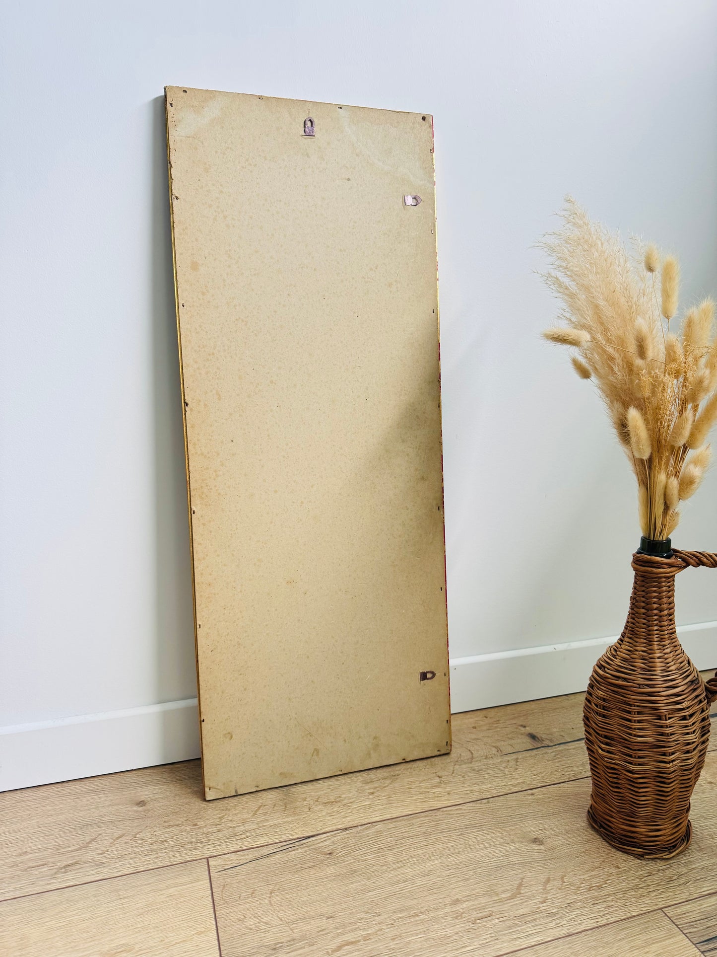 Miroir ancien doré au style classique