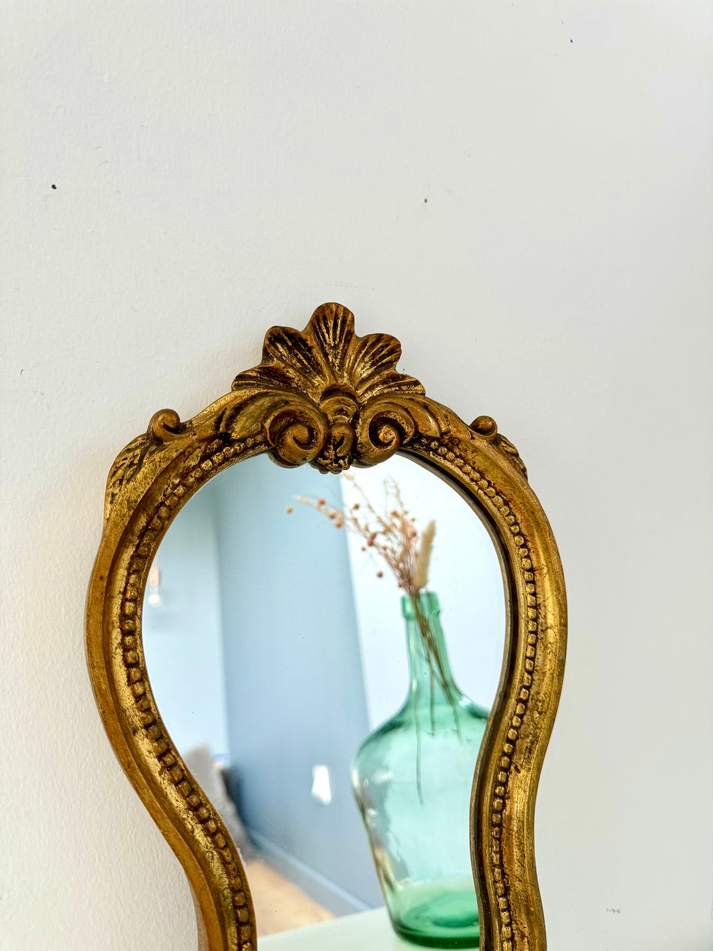 Miroir ancien doré de style baroque