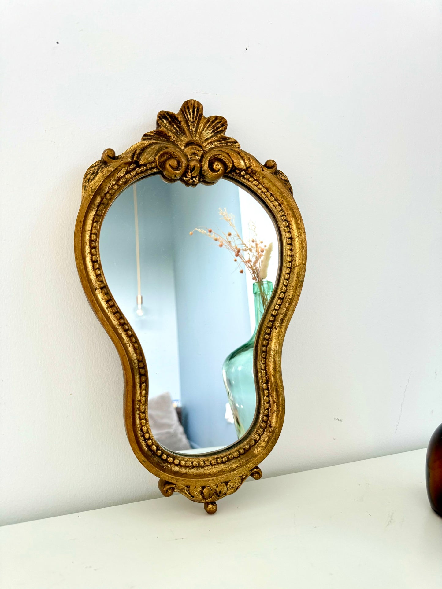 Miroir ancien doré de style baroque